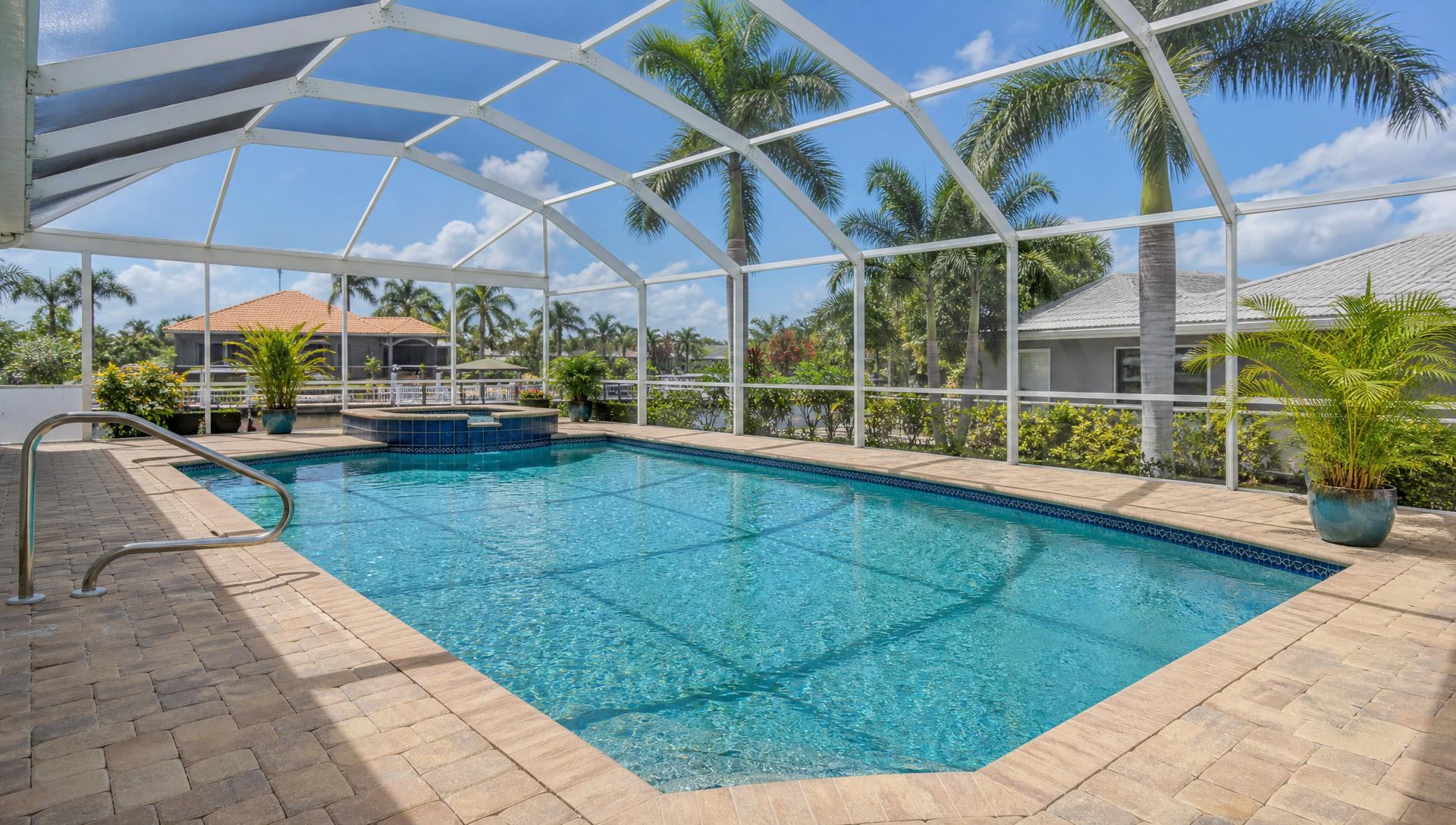 Screened pool with paver deck